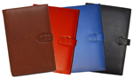 black, tan, red and blue leather planners