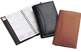 inside and outside views of black and brown leather pocket secretaries